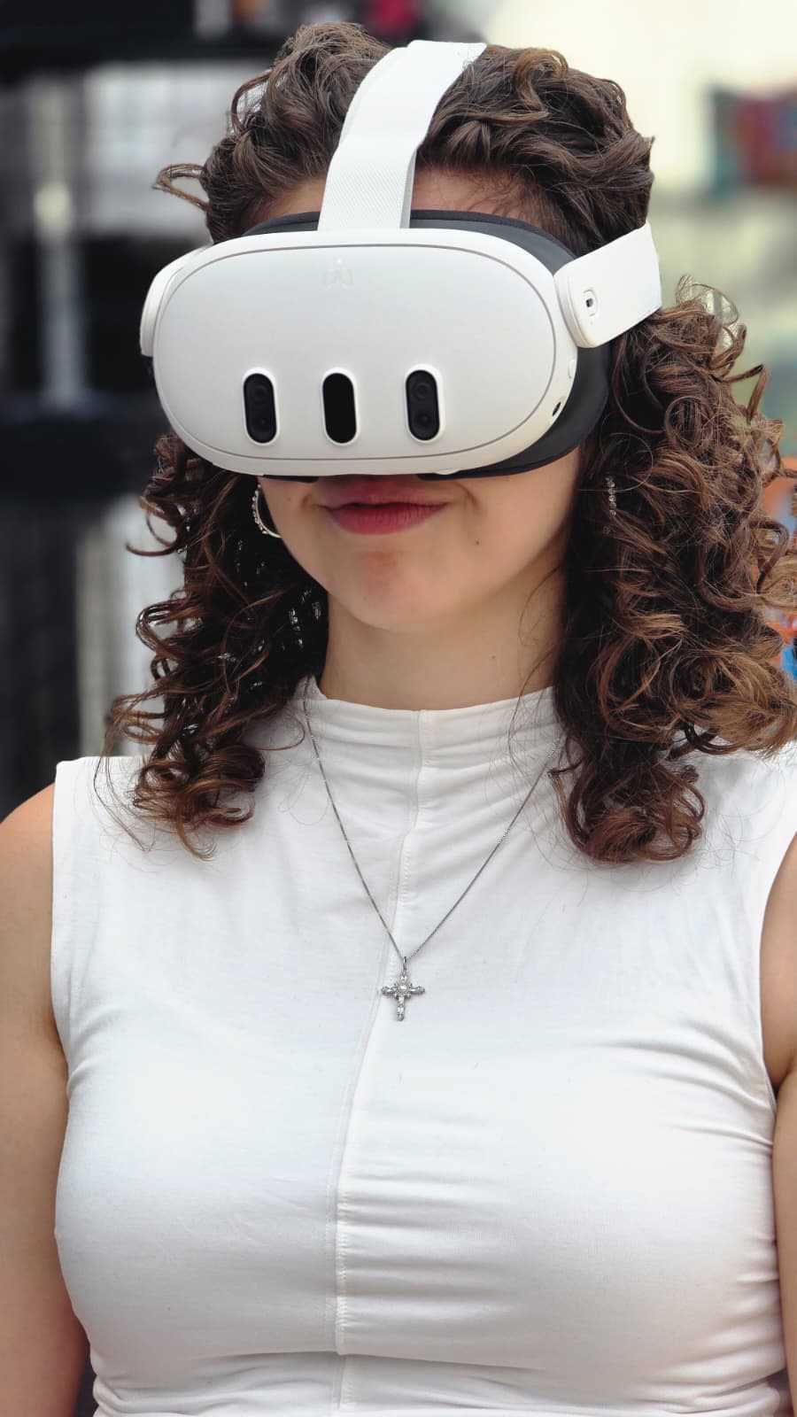 A participant wearing a UKind XR headset during a demonstration